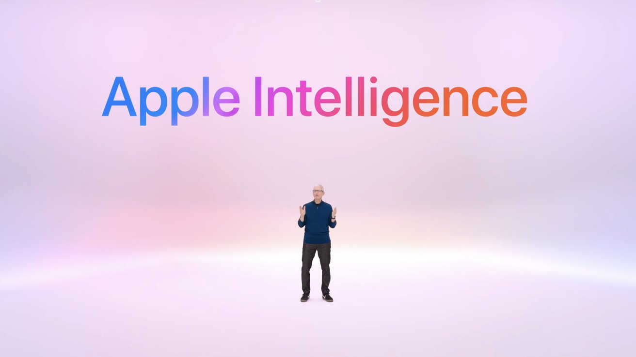 Tim Cook standing on a light pink gradient background with large text above reading 'Apple Intelligence' in multicolored letters.