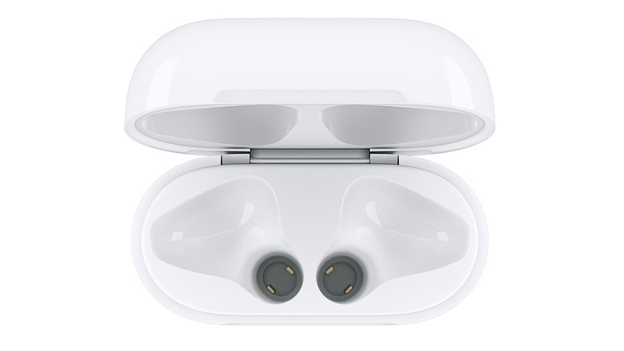 Open white charging case holding two wireless earbuds, viewed from above.